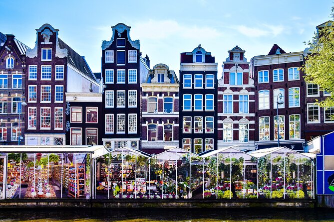 Amsterdam Day Trip from Brussels With Cheese, Clogs and Windmills - De Gooyer windmill stop: what 15 minutes can realistically do
