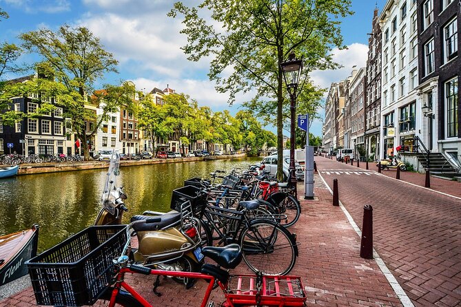 Amsterdam Day Trip from Brussels With Cheese, Clogs and Windmills - Dam Square to Royal Palace area: your Amsterdam anchor moment