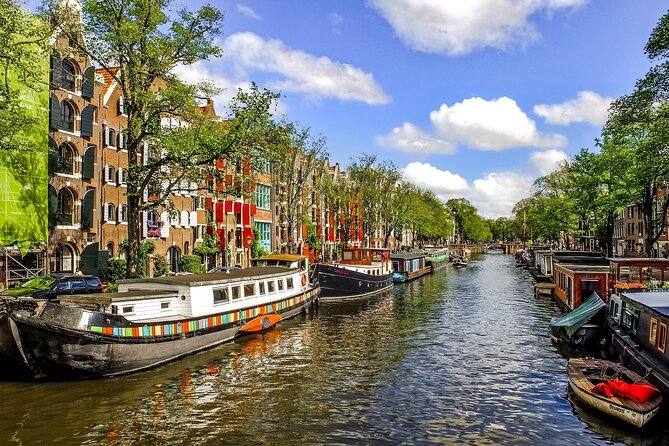 Amsterdam Day Trip from Brussels With Cheese, Clogs and Windmills - Optional 75-minute canal cruise: how to fit it without losing the day