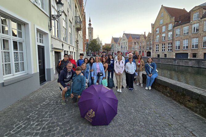 Authentic and Complete Bruges, with Local Guide and Chocolate - Belfort Tower and Burg Square: civic power and architectural contrast
