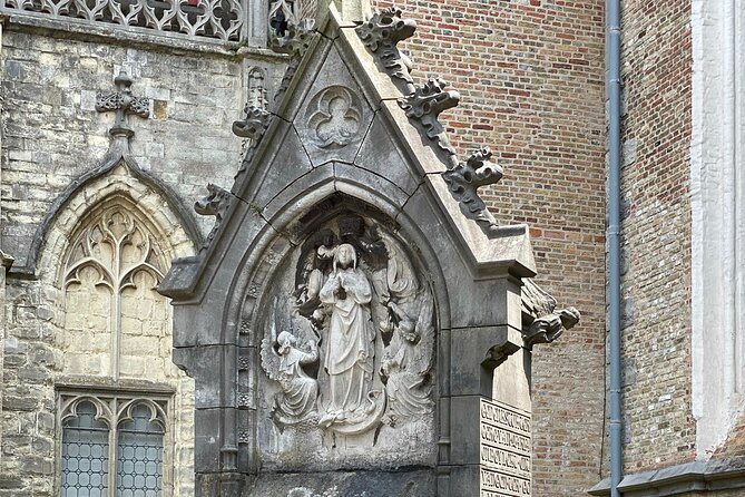 Bruges by a Local: Exciting Stories, Mysteries, People and Choco - Burg Square and the Holy Blood Basilica stop that sparks curiosity