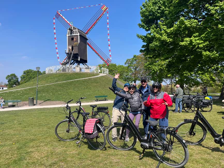 Bruges: Guided Bike Tour with a Local to Sights & Secrets - Canals, windmills, and the Church of Our Lady along the route
