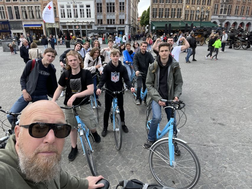 Bruges: Guided Bike Tour with a Local to Sights & Secrets - What you get from the local guide besides photos