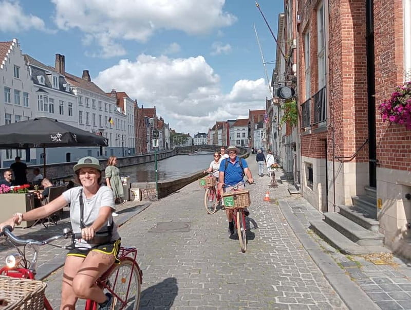 Bruges: Guided Retro Bike Tour of Highlights and Hidden Gems - Bruges City Hall and Rozenhoedkaai: civic power plus postcard waterlines