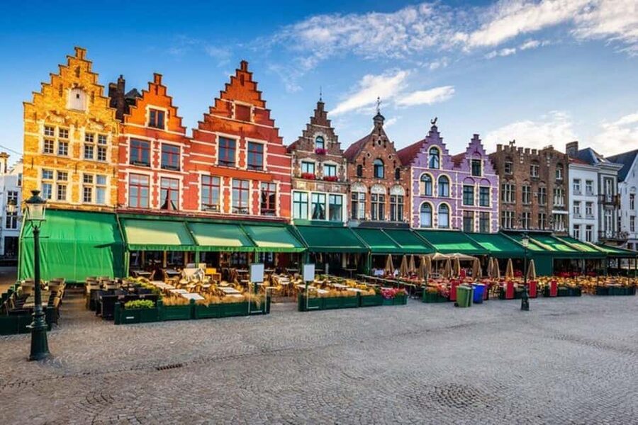 Bruges : Highlights & Hidden gems Walking Tour - Burg Square: fortress origins and the core of the city