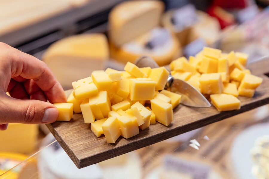 Bruges: Private Food Tour – 10 Tastings with Locals - Meeting your guide outside Kruidvat: what makes the tour feel local