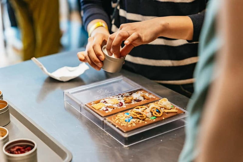 Brussels: Make Your Own Chocolates Workshop with Tastings - Inside the training centre: hairnets, air-con, and a real workshop vibe