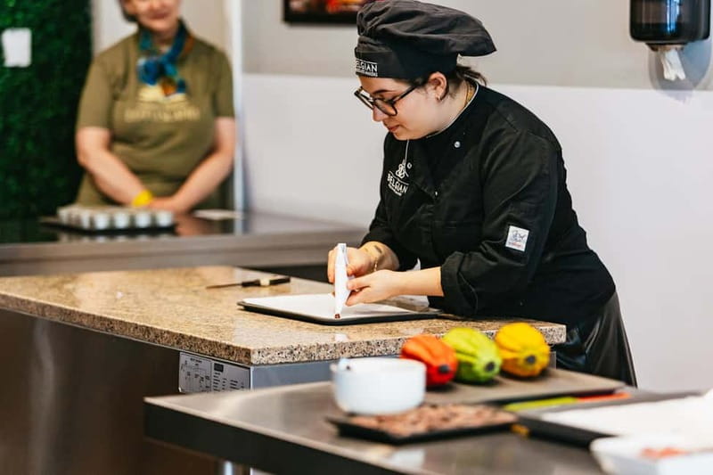 Brussels: Make Your Own Chocolates Workshop with Tastings - The chocolate makers and the bean-to-bar machinery visit