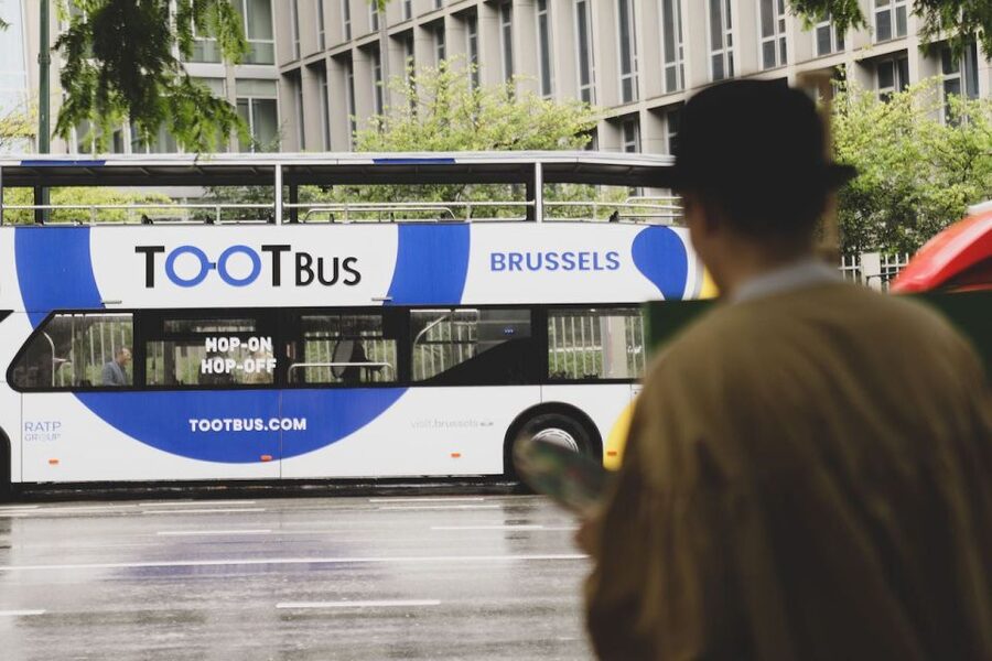Brussels: Sightseeing Sunset Bus Tour - Audio Guide in 10 Languages, and What It Means for Your Time