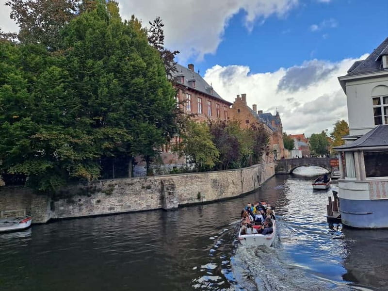 Day trip to Bruges from Paris with canal cruise - Leaving Paris early in a small minivan (8 people max)