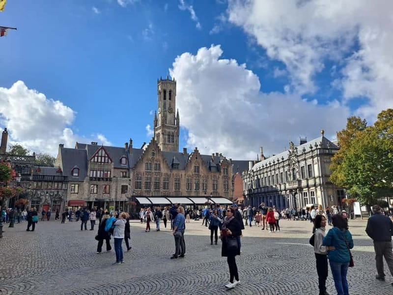 Day trip to Bruges from Paris with canal cruise - Bruges orientation walk: Belfry, Grand Place, Burg Square, beguinage, Lake of Love