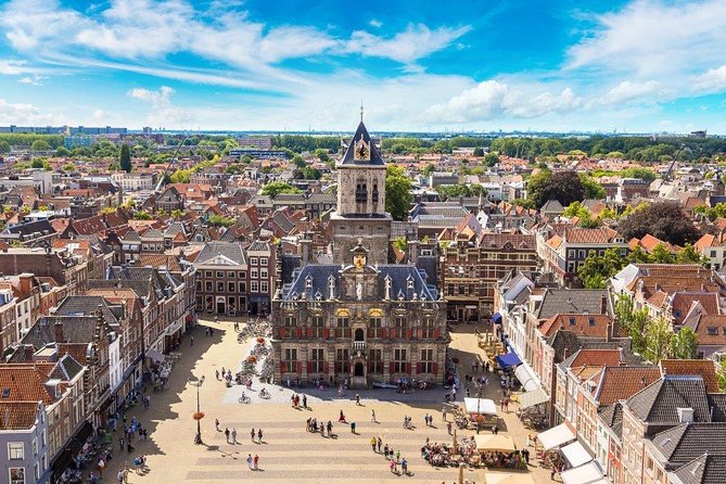 Delft and Keukenhof Gardens Tour from Brussels - The guide experience: multilingual storytelling and real personalities