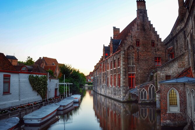 Experience the best of Bruges on a Private Tour with Boat Ride - Minnewater Lake and the Lovers Bridge: Calm in the Middle of Town