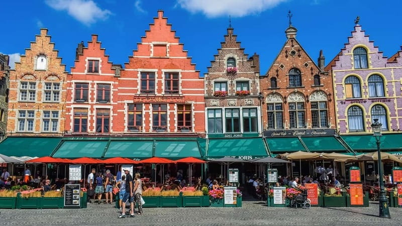 From Amsterdam: Private Sightseeing Tour to Bruges - Arriving in Bruges: Cobblestones, Canals, Bridges, and First Impressions