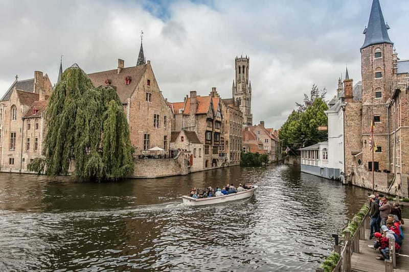 From Brussels: Bruges Full-Day Trip by Train - The 2.5-hour guided walk: Market Square, guildhalls, and canal-side context