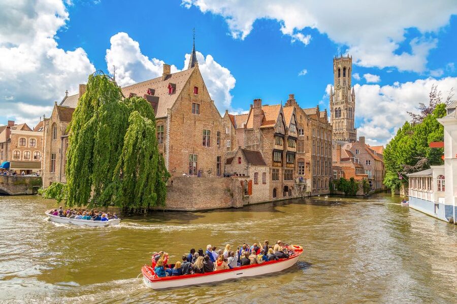 From Paris: Day Trip to Bruges with Optional Seasonal Cruise - Groeningemuseum, lace, and chocolates: pick one big “extra”