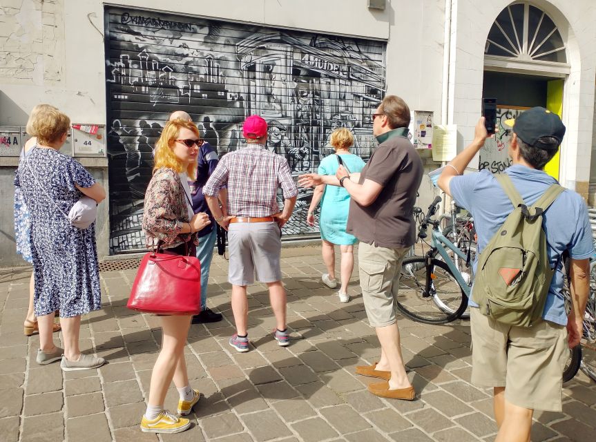 Ghent: Guided City Tour with Food Tastings - Timing and walking comfort: 150 minutes, relaxed pace, rain or shine