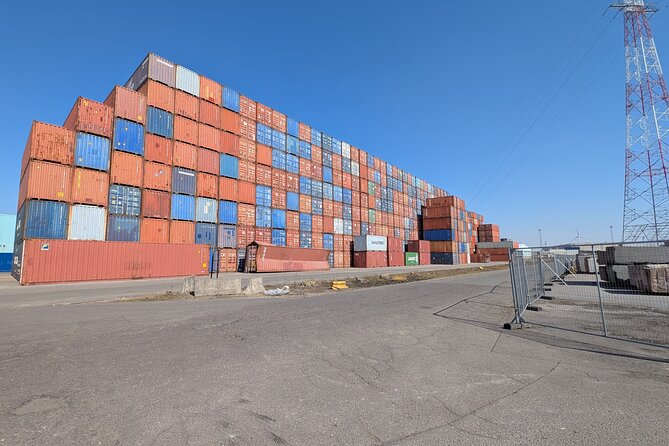 Guided Antwerp Port Tour, in your Car or Minibus - Dock 910 on Zandvlietweg: Terminal in Motion, Containers Like Steel Cities