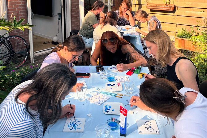 Private Souvenir Creation in Dutch Delft Blue from Netherlands - The Colour on clay atelier garden setting, plus snacks and music