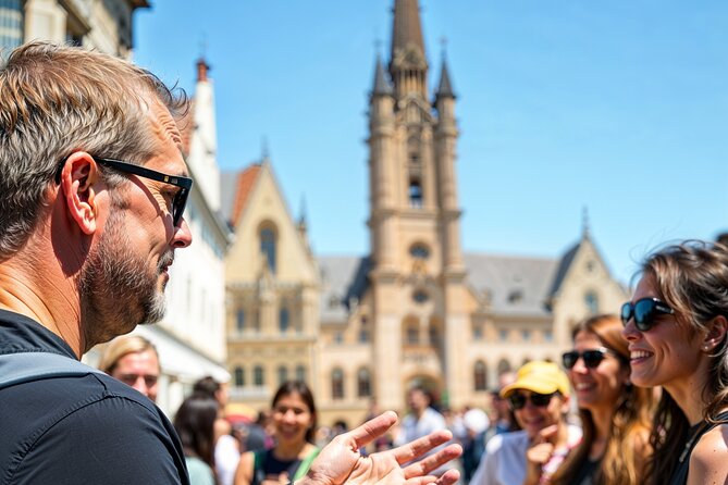 Secrets of Bruges: Walking Tour With a Chocolate and Waffle Bite - Market Square to Belfort Tower, where your bearings click into place