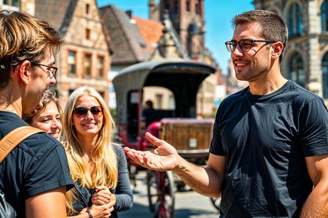 Secrets of Bruges: Walking Tour With a Chocolate and Waffle Bite - Market Square facades and the question of what stood there before